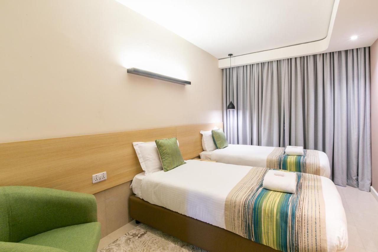 Kozi Suites Nairobi Airport Syokimau Exteriör bild
