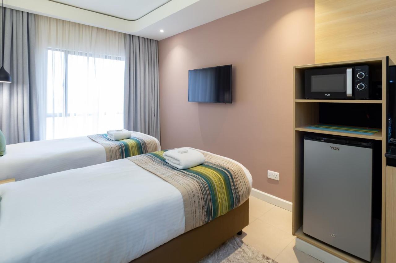 Kozi Suites Nairobi Airport Syokimau Exteriör bild