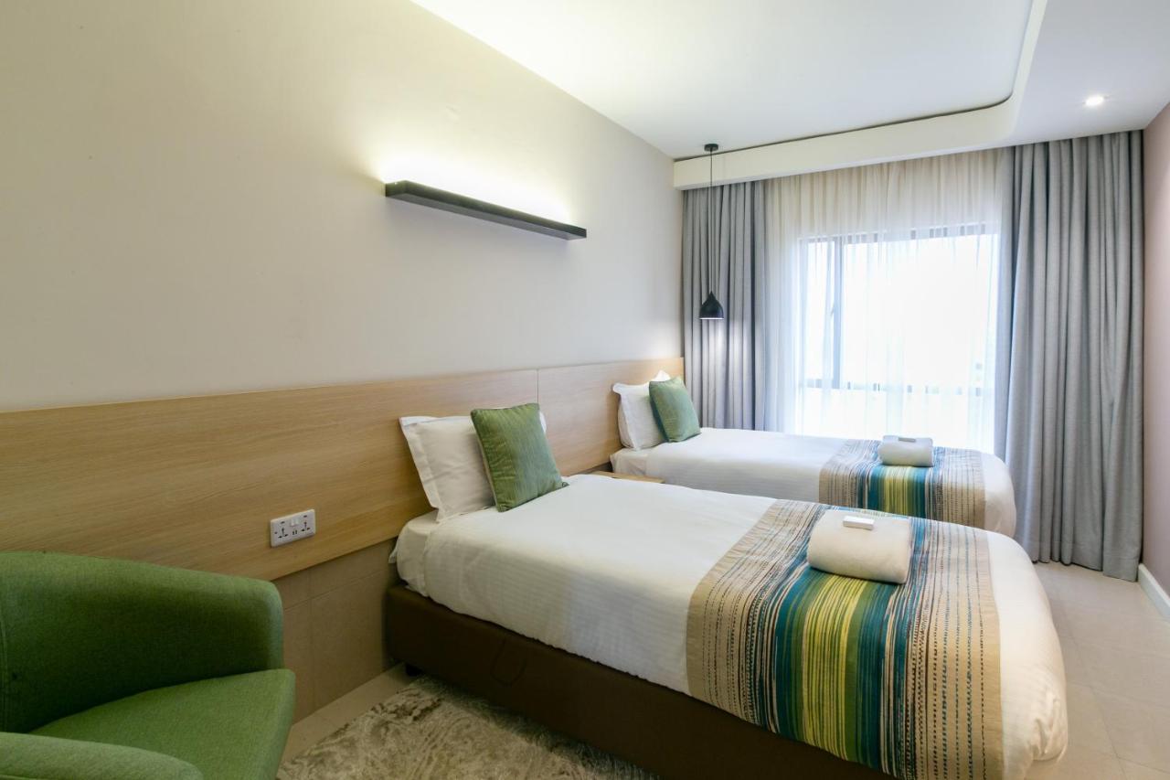 Kozi Suites Nairobi Airport Syokimau Exteriör bild
